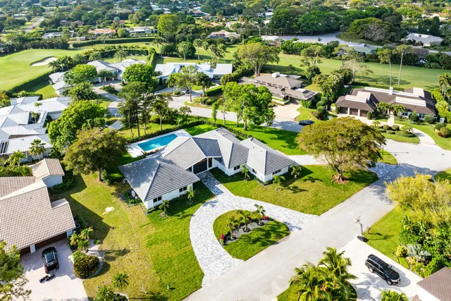 a view of house with garden space and street view