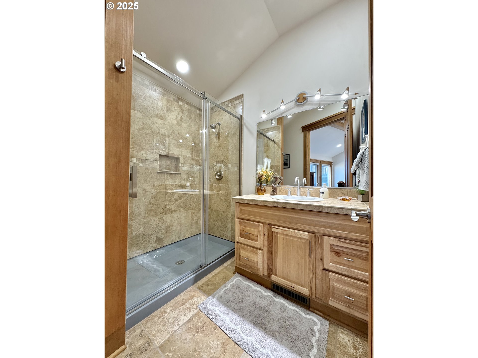 94098 Rubys Way Gold Beach, OR 97444 - Photo 20 of 48 a bathroom with a double vanity sink mirror and shower