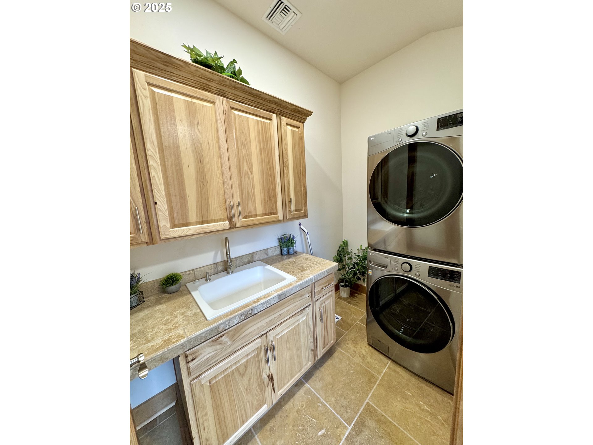 94098 Rubys Way Gold Beach, OR 97444 - Photo 29 of 48 a utility room with sink dryer and washer