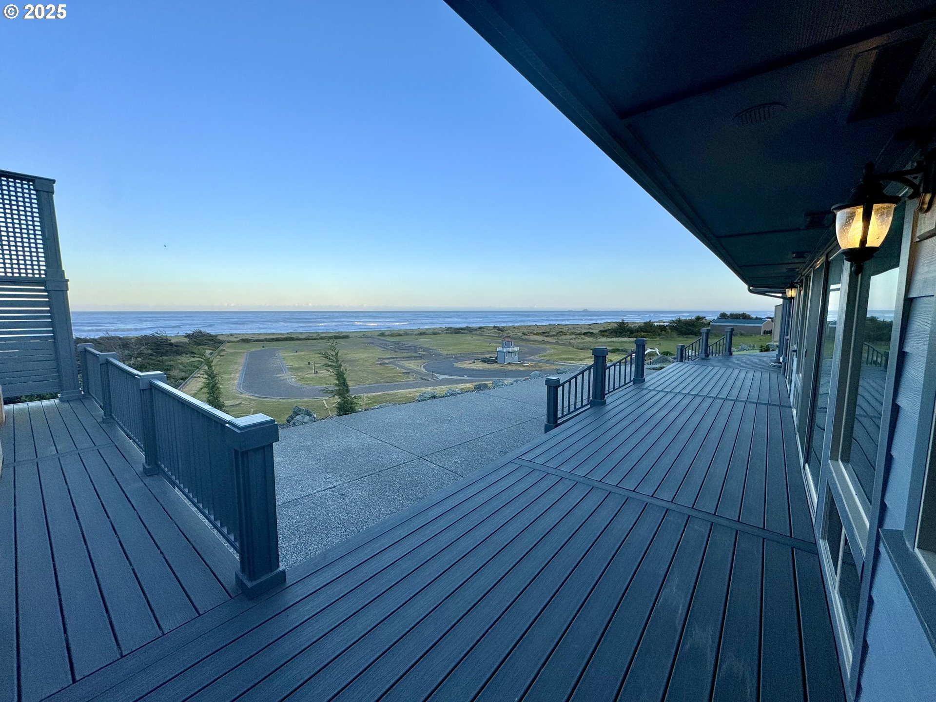 94098 Rubys Way Gold Beach, OR 97444 - Photo 35 of 48 a view of outdoor space with wooden floor and seating