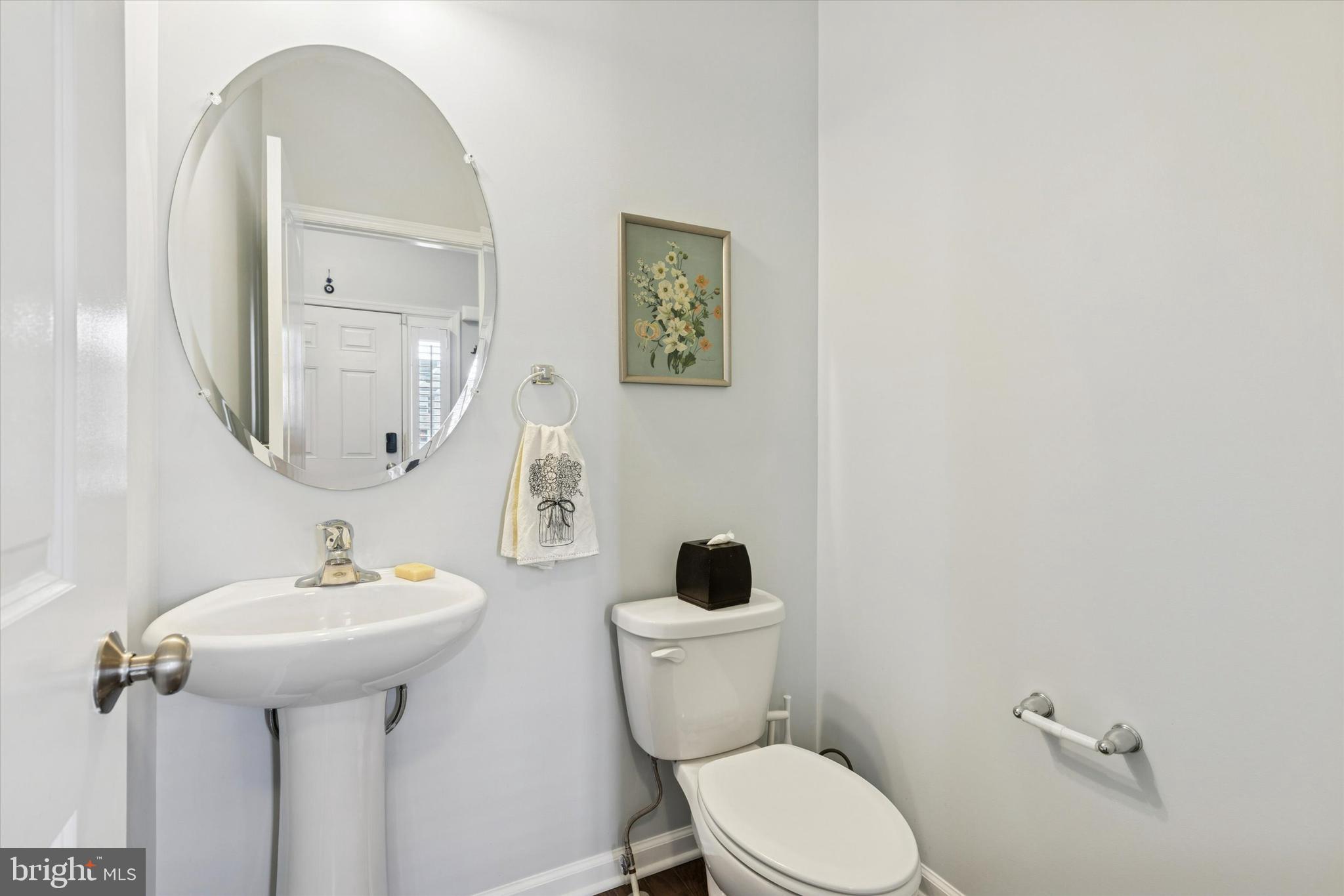 3711 Jacob Stout Road, Unit 5 Doylestown, PA 18902 - Photo 4 of 25 a bathroom with a toilet sink and mirror