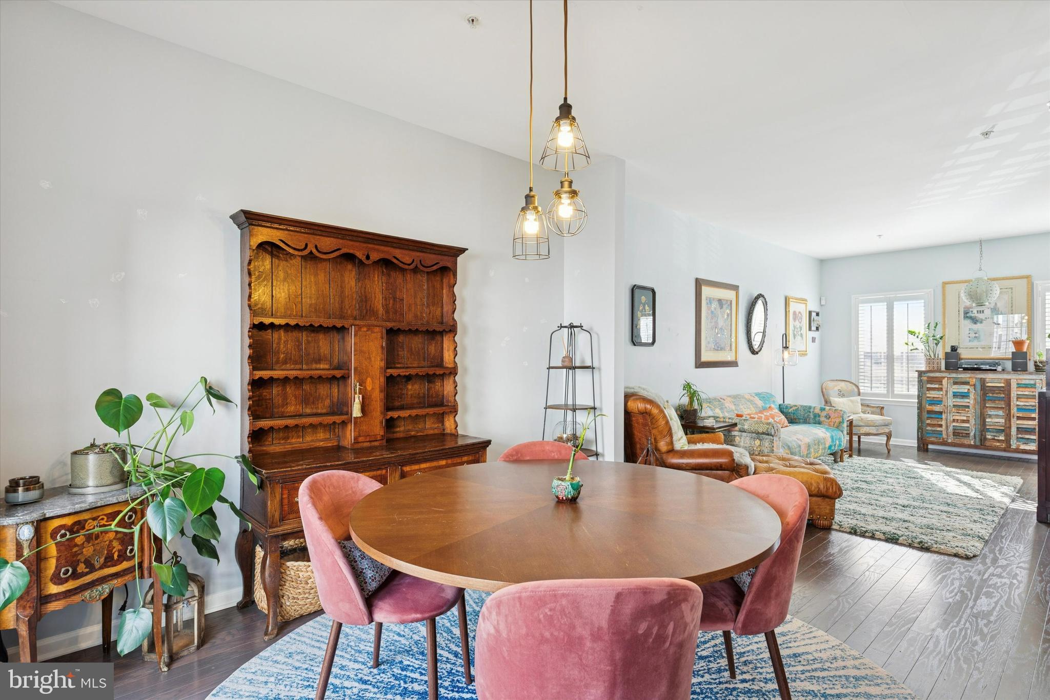 3711 Jacob Stout Road, Unit 5 Doylestown, PA 18902 - Photo 7 of 25 a dining room with furniture a window and wooden floor