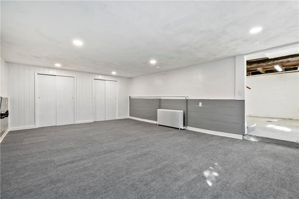 5154 North Pioneer Road Gibsonia, PA 15044 - Photo 23 of 26 Lower level finished game room/family room measuring approximately 22x15