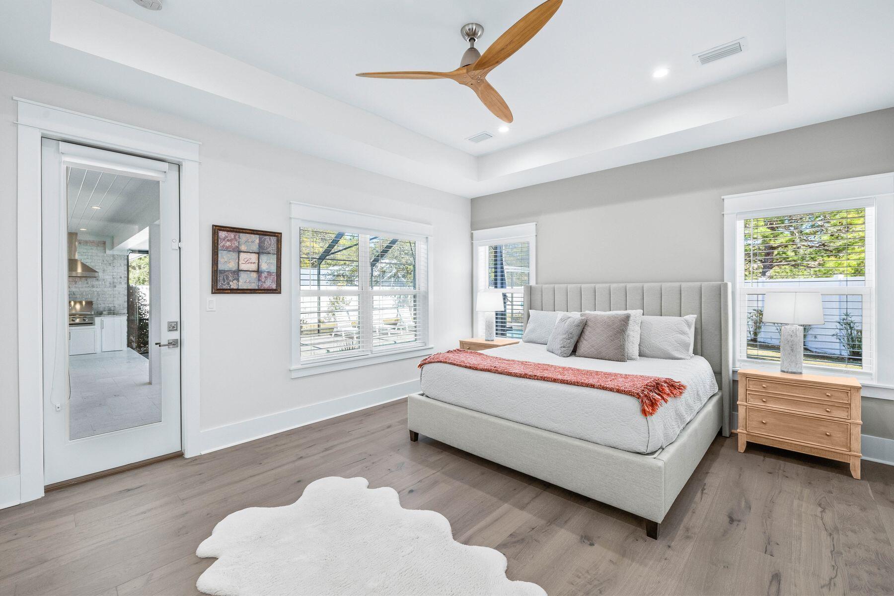 274 Ridge Road Santa Rosa Beach, FL 32459 - Photo 21 of 40 a spacious bedroom with a bed and a window