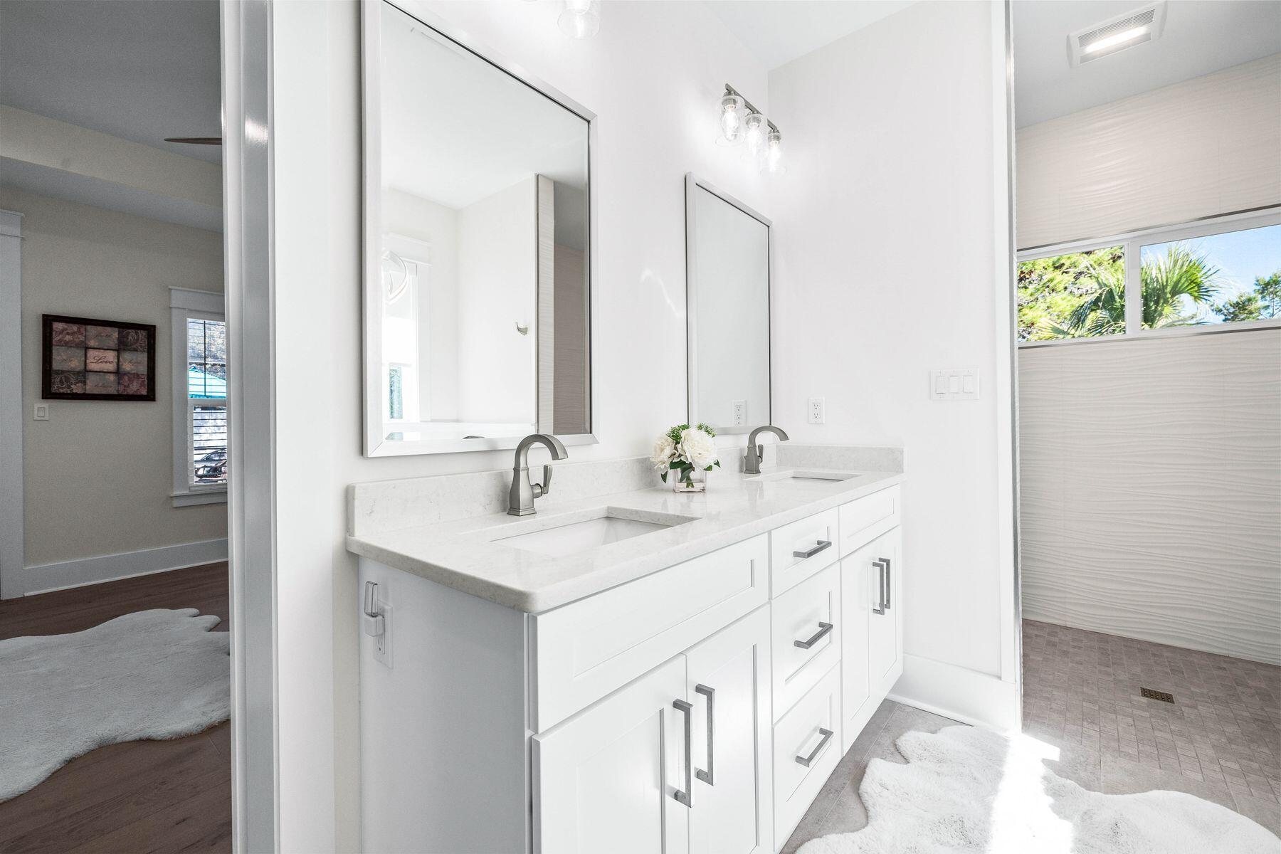 274 Ridge Road Santa Rosa Beach, FL 32459 - Photo 23 of 40 a bathroom with a double vanity sink and a mirror