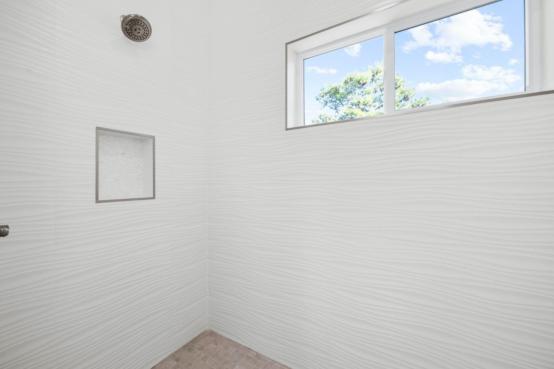 274 Ridge Road Santa Rosa Beach, FL 32459 - Photo 25 of 40 a view of a small space with wooden floor and a window