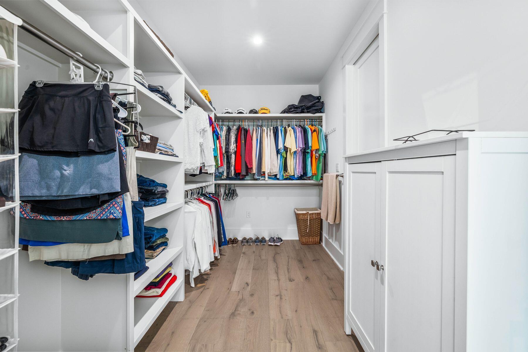 274 Ridge Road Santa Rosa Beach, FL 32459 - Photo 27 of 40 a view of walk in closet with clothes and shoes