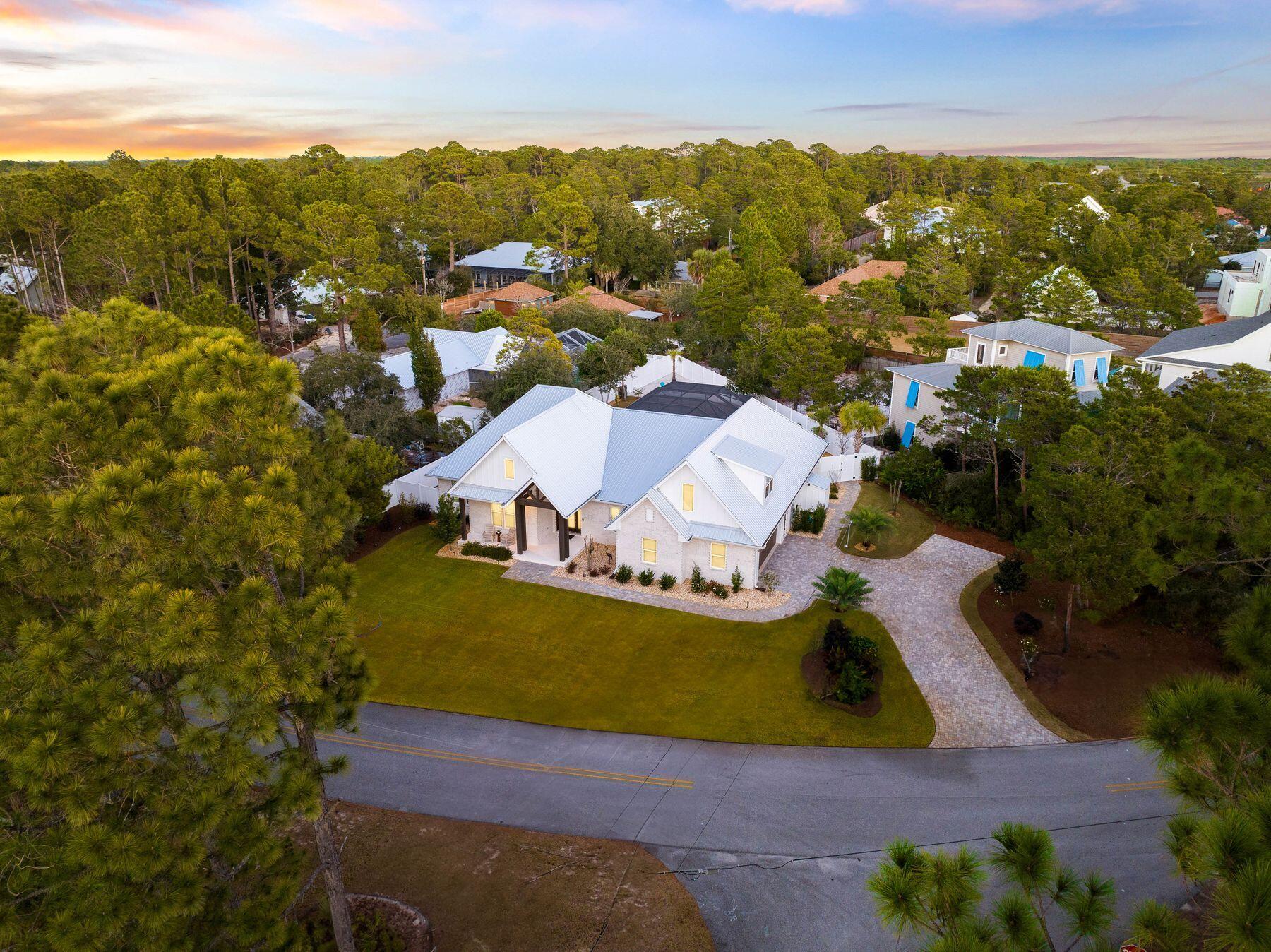 274 Ridge Road Santa Rosa Beach, FL 32459 - Photo 7 of 40 a view of a city with mountains in the background