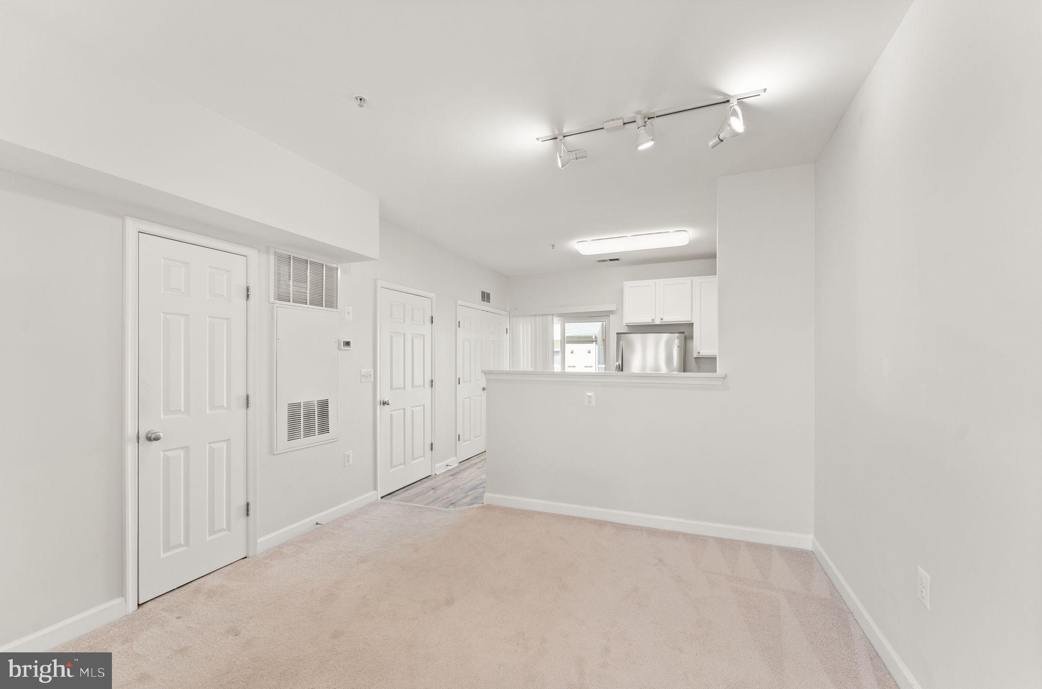 42427 Goldenseal Square Brambleton, VA 20148 - Photo 12 of 52 wooden floor in an empty room