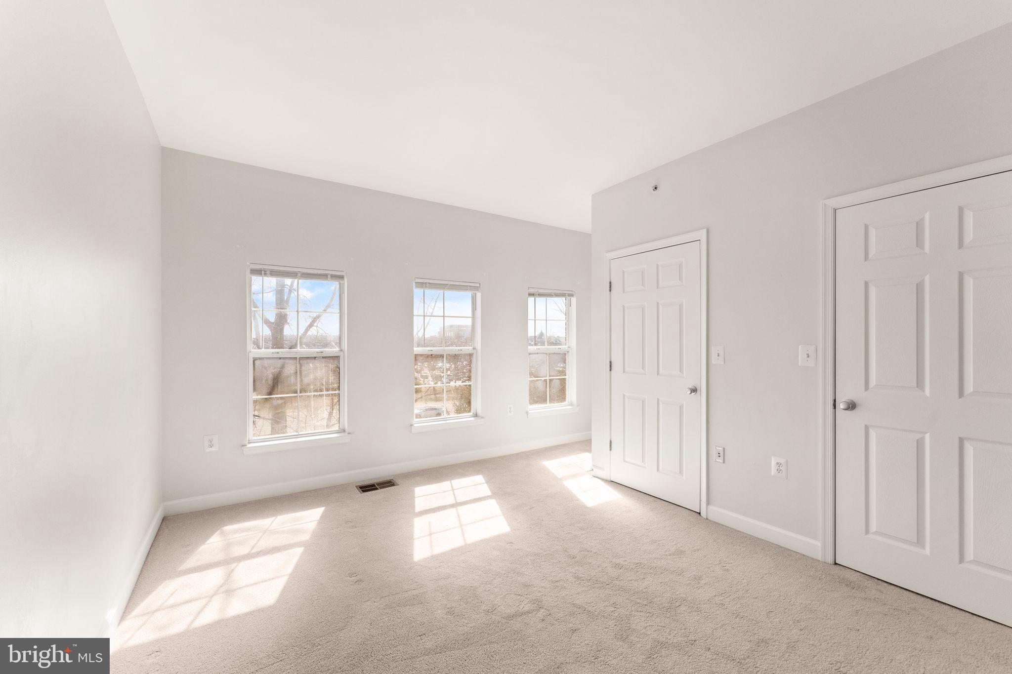 42427 Goldenseal Square Brambleton, VA 20148 - Photo 32 of 52 a view of an empty room with a window