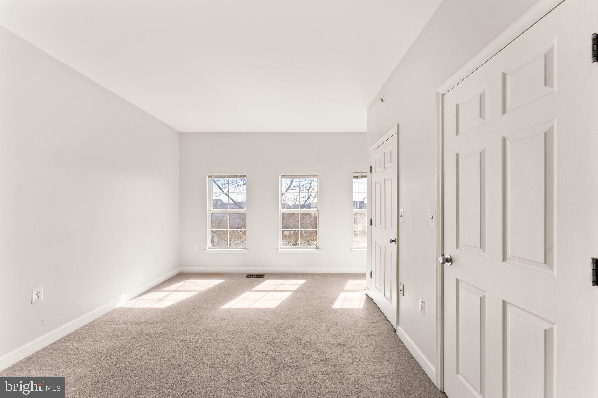42427 Goldenseal Square Brambleton, VA 20148 - Photo 33 of 52 a view of an empty room with a window