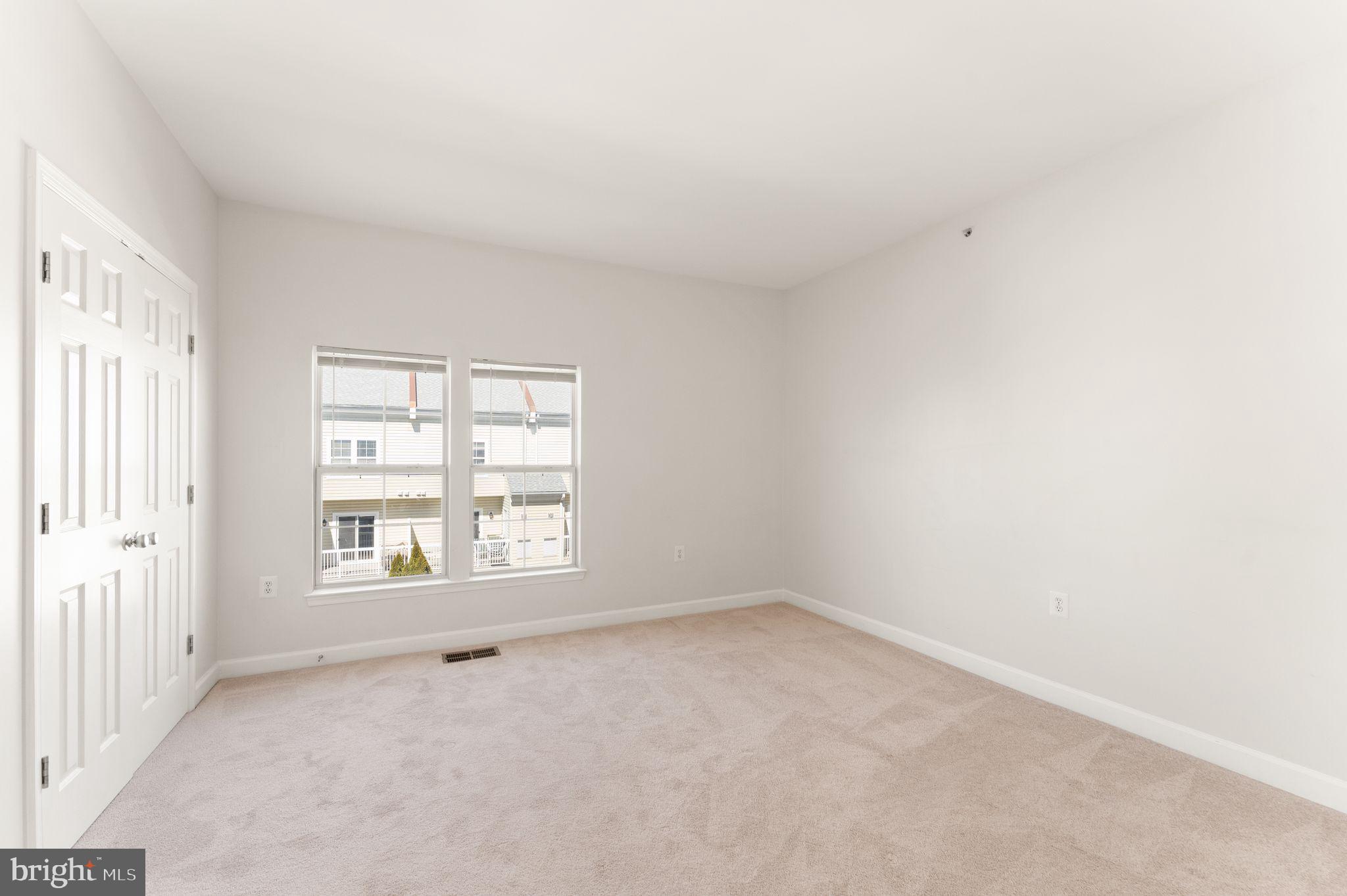 42427 Goldenseal Square Brambleton, VA 20148 - Photo 39 of 52 an empty room with a window