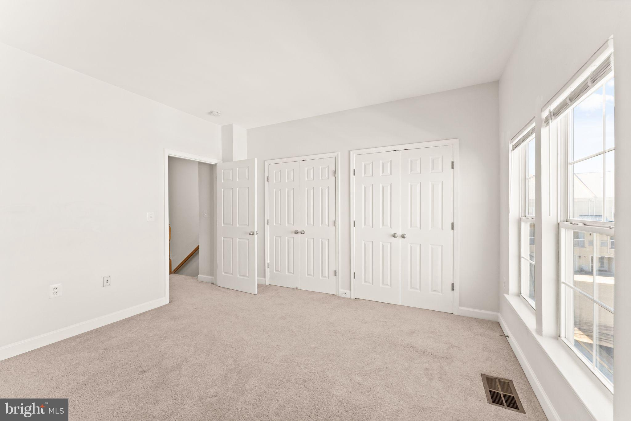 42427 Goldenseal Square Brambleton, VA 20148 - Photo 41 of 52 a view of an empty room with a window