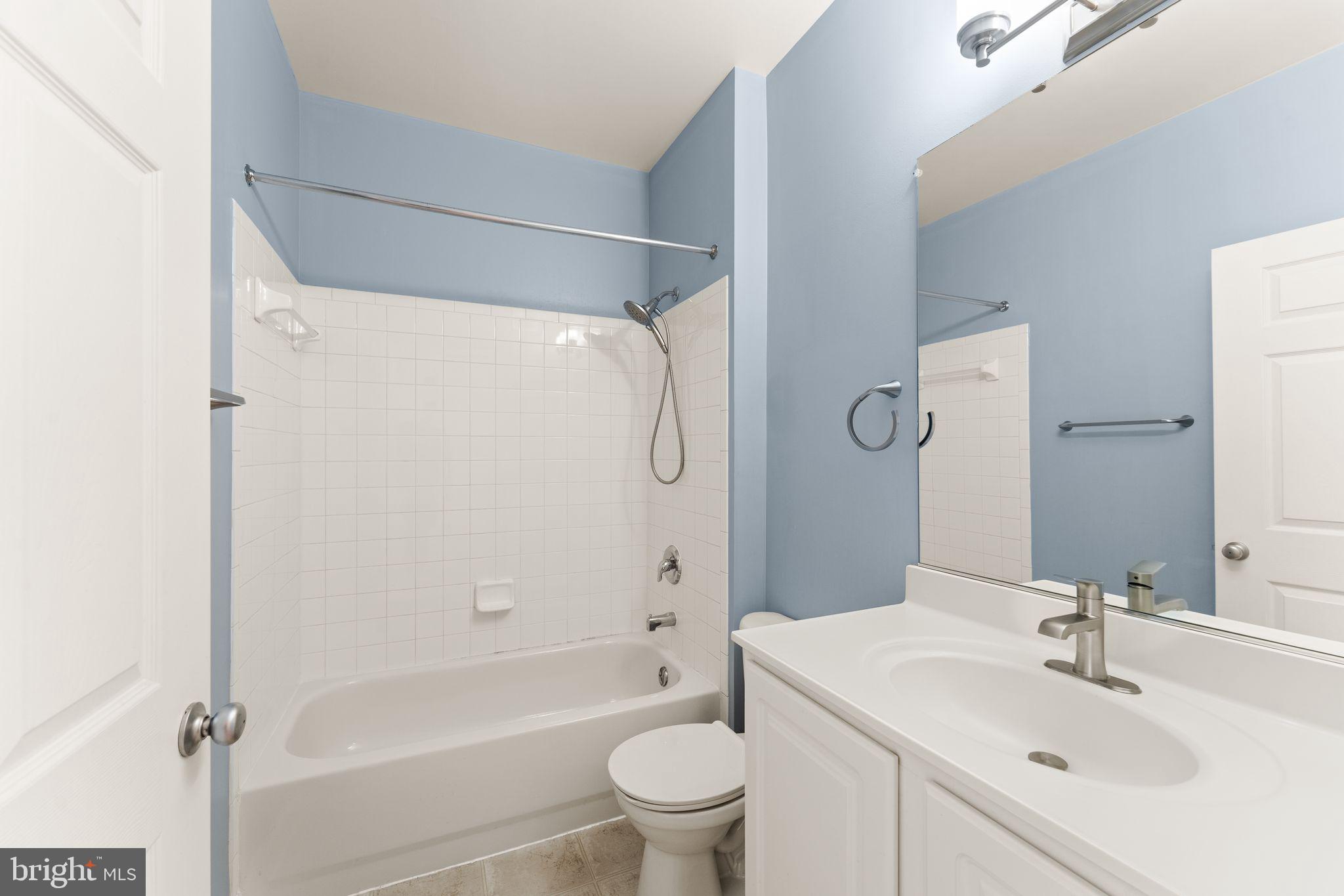 42427 Goldenseal Square Brambleton, VA 20148 - Photo 43 of 52 a bathroom with a sink toilet and shower