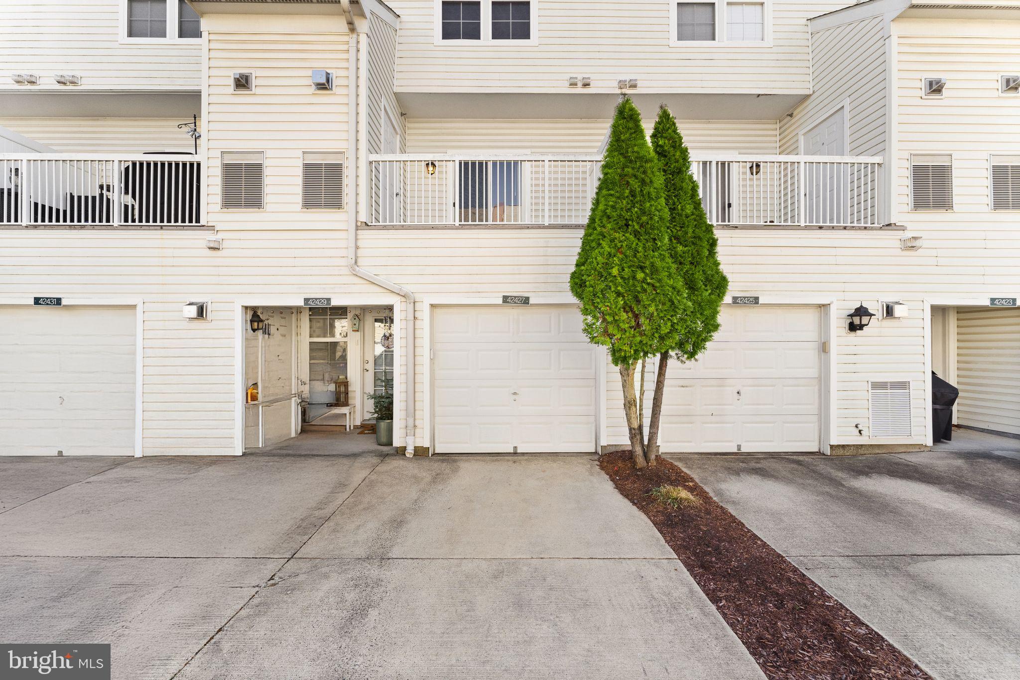 42427 Goldenseal Square Brambleton, VA 20148 - Photo 46 of 52 a view of a house with street