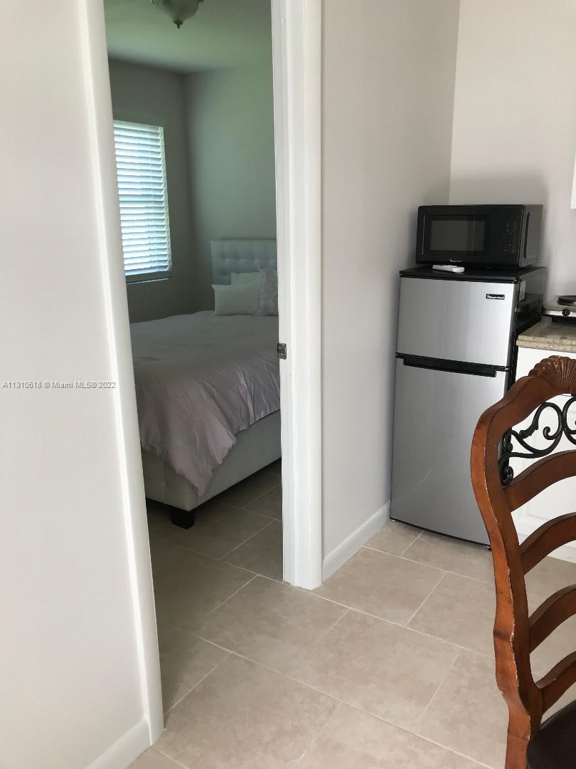 Westchester Miami, FL 33155 - Photo 3 of 8 a view of kitchen with furniture and refrigerator