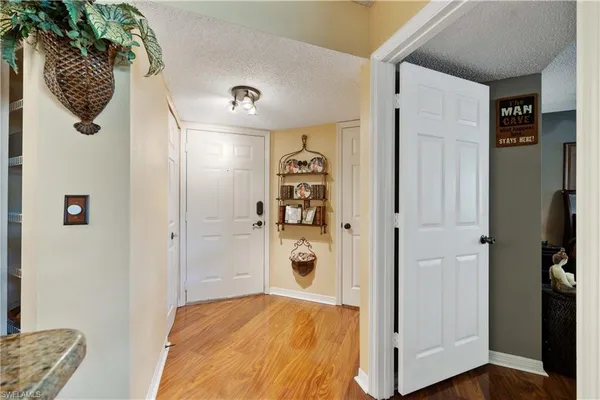 a bedroom with a bed and a walk in closet