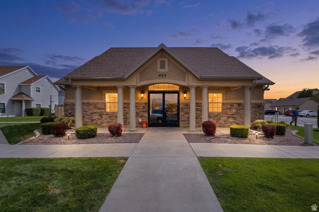 482 South 2500th West, Unit 2 Springville, UT 84663 - Photo 27 of 52 Building exterior featuring a gabled roof, stone veneer accents, and four decorative columns