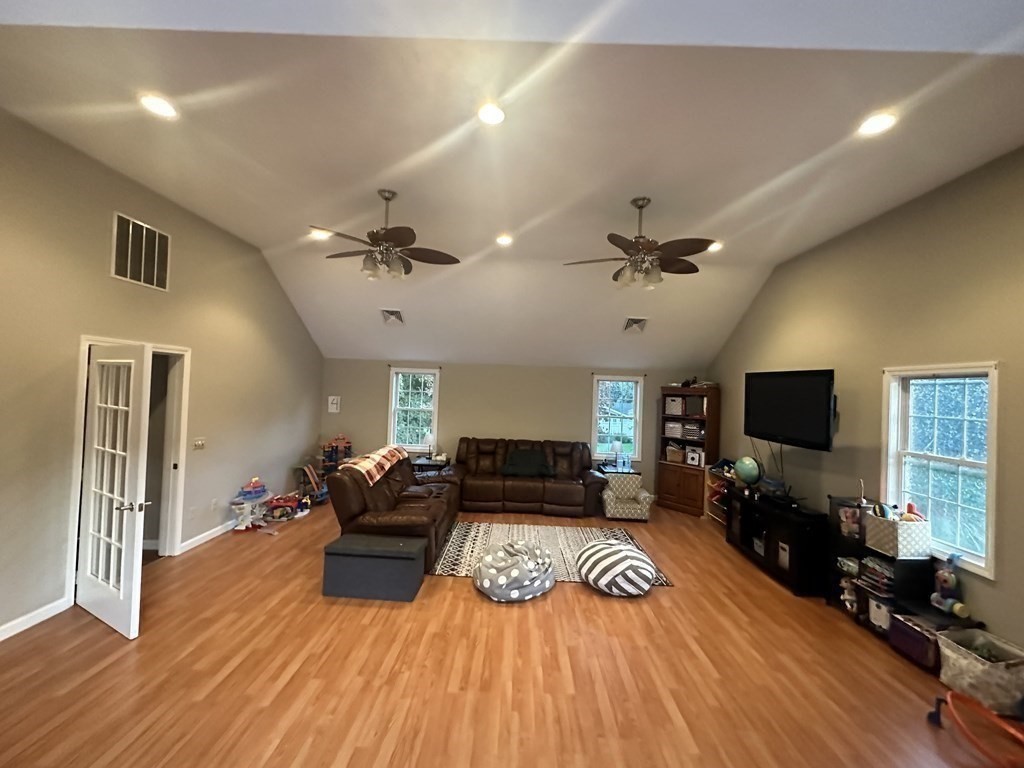4 Williams Road Sturbridge, MA 01566 - Photo 18 of 30 a living room with furniture and a flat screen tv