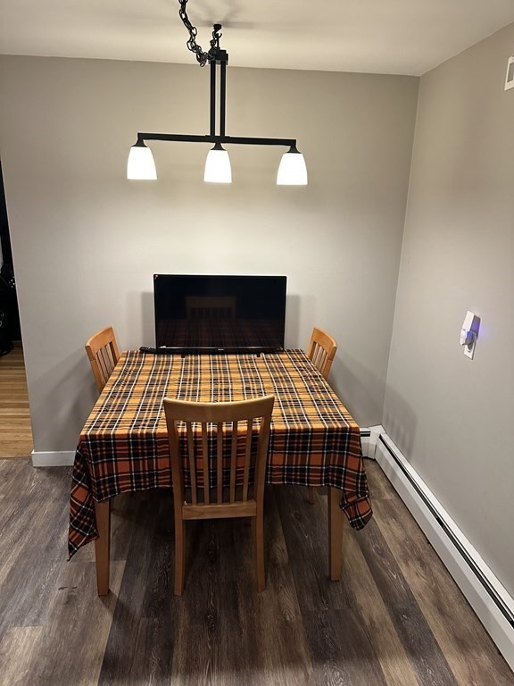 4 Williams Road Sturbridge, MA 01566 - Photo 6 of 30 a bed sitting in a room next to a lamp
