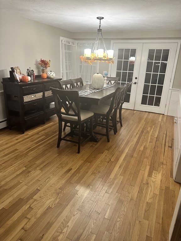 4 Williams Road Sturbridge, MA 01566 - Photo 8 of 30 a view of a dining room with furniture and chandelier
