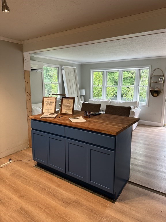 31 Harrington Road Charlton, MA 01507 - Photo 9 of 10 a room with wooden floor and furniture