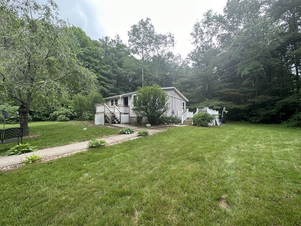 31 Harrington Road Charlton, MA 01507 - Photo 10 of 10 a view of a house with a park