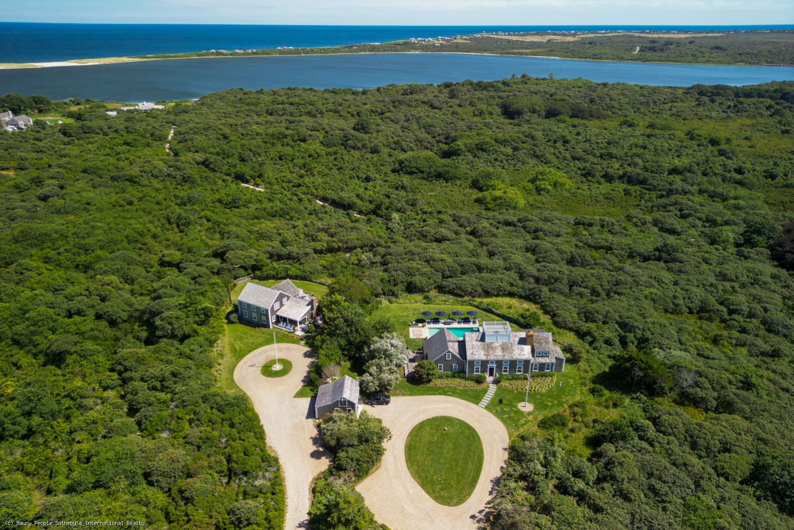 21 Quidnet Road Nantucket, MA 02554 - Photo 4 of 62 a aerial view of a house with swimming pool and large trees