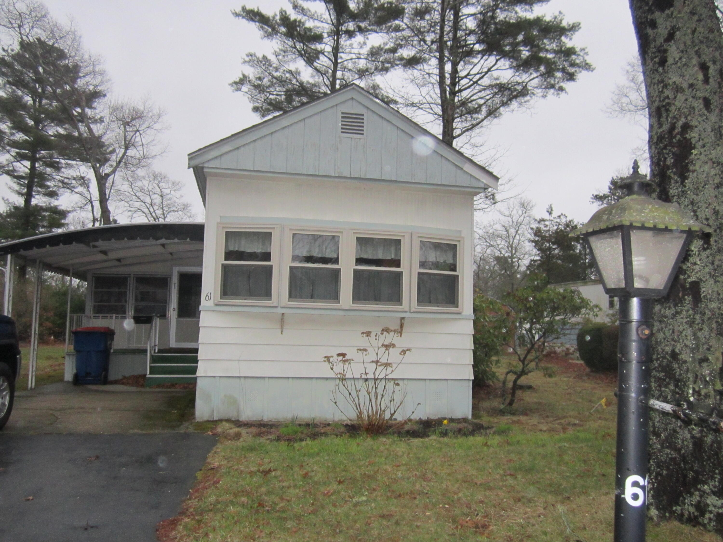 61 Timber Lane West Wareham, MA 02576 - Photo 1 of 32 a front view of a house with garden