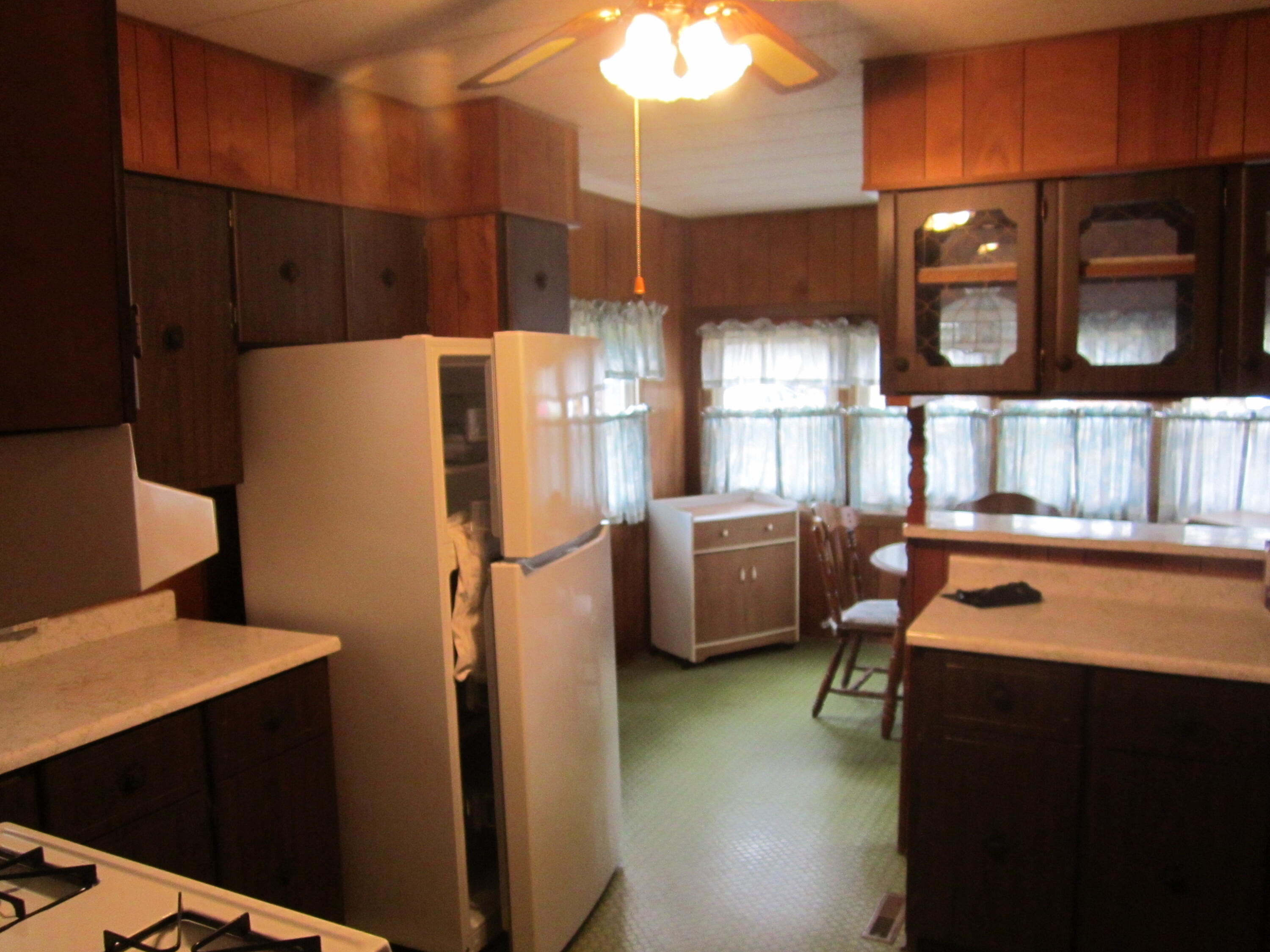 61 Timber Lane West Wareham, MA 02576 - Photo 16 of 32 a kitchen with refrigerator a washer and a sink