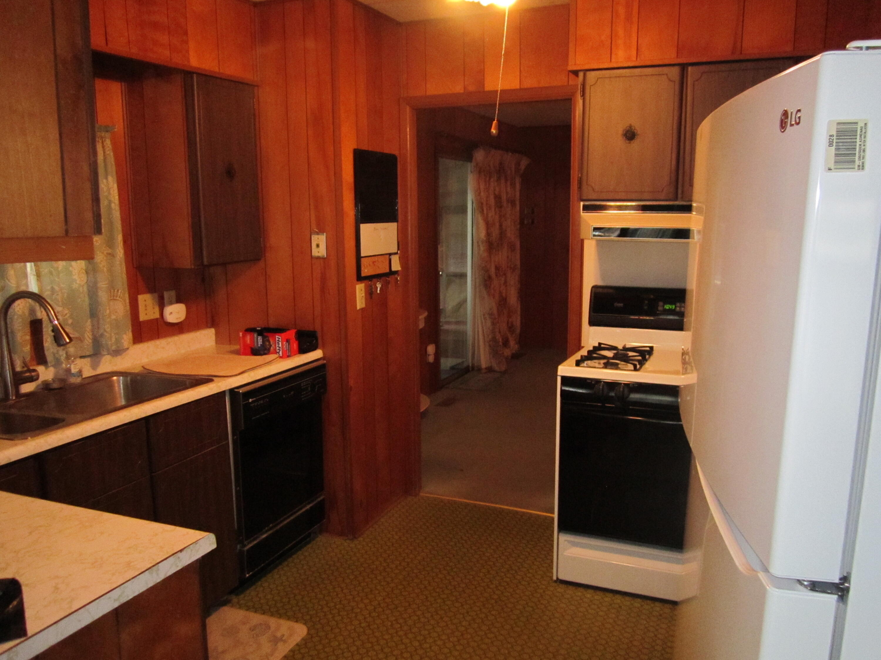 61 Timber Lane West Wareham, MA 02576 - Photo 18 of 32 a kitchen with stainless steel appliances a refrigerator and a sink