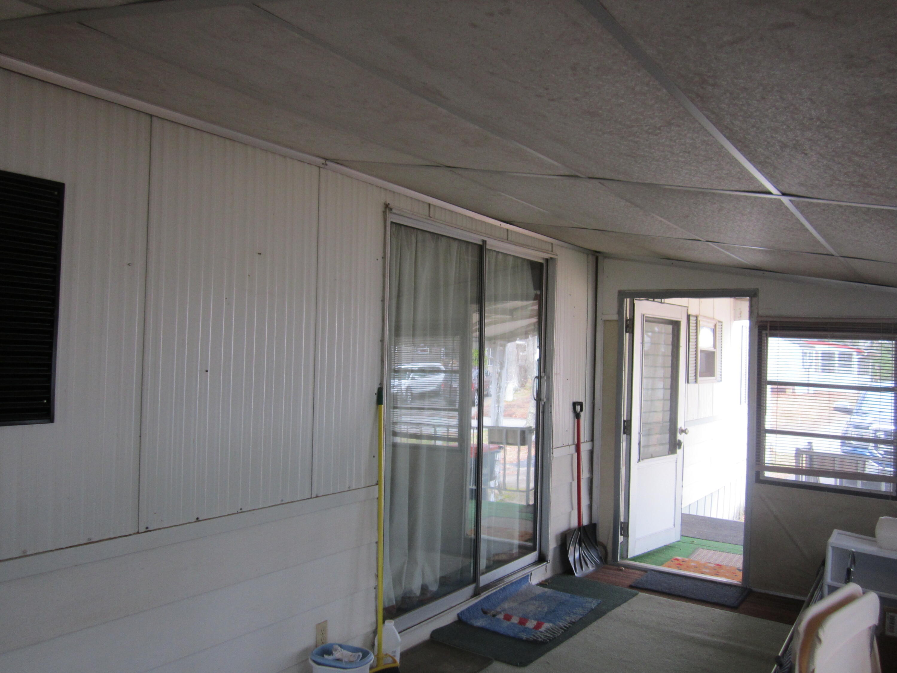 61 Timber Lane West Wareham, MA 02576 - Photo 20 of 32 a view of a room with large windows