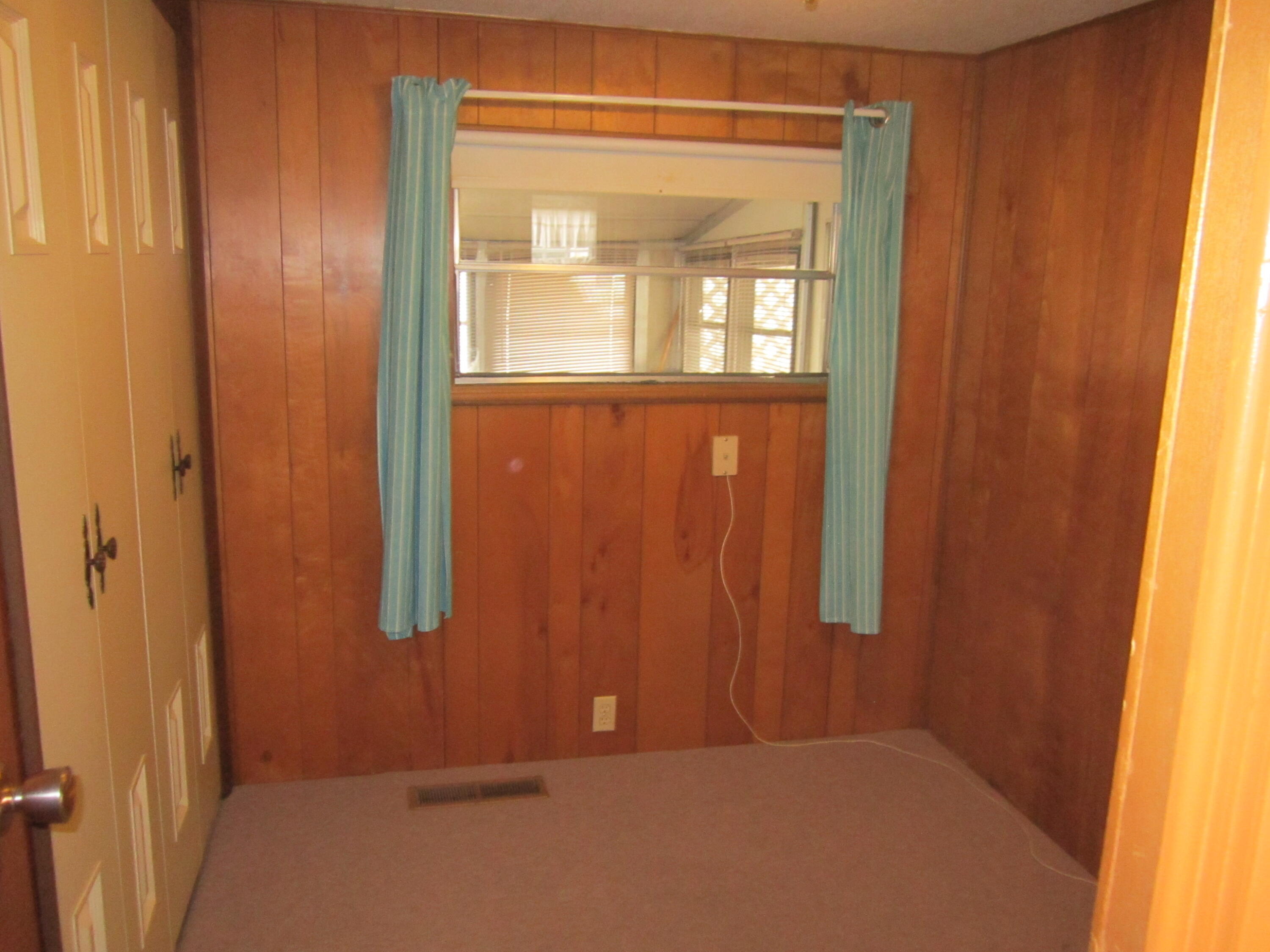 61 Timber Lane West Wareham, MA 02576 - Photo 25 of 32 an empty room with windows and closet