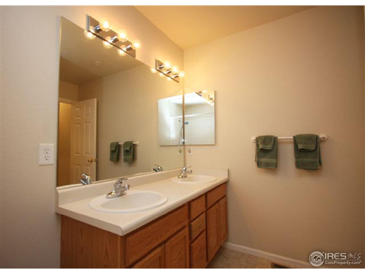2621 Rigden Parkway, Unit C3 Fort Collins, CO 80525 - Photo 11 of 17 a bathroom with a sink and a mirror
