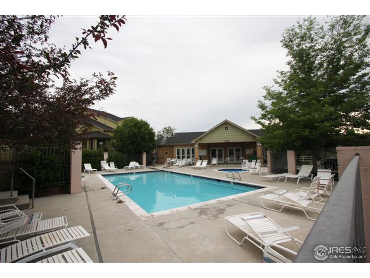 2621 Rigden Parkway, Unit C3 Fort Collins, CO 80525 - Photo 15 of 17 a view of a house with swimming pool and sitting area