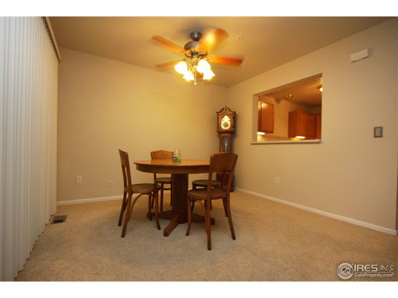2621 Rigden Parkway, Unit C3 Fort Collins, CO 80525 - Photo 7 of 17 a view of a dining room with furniture and wooden floor