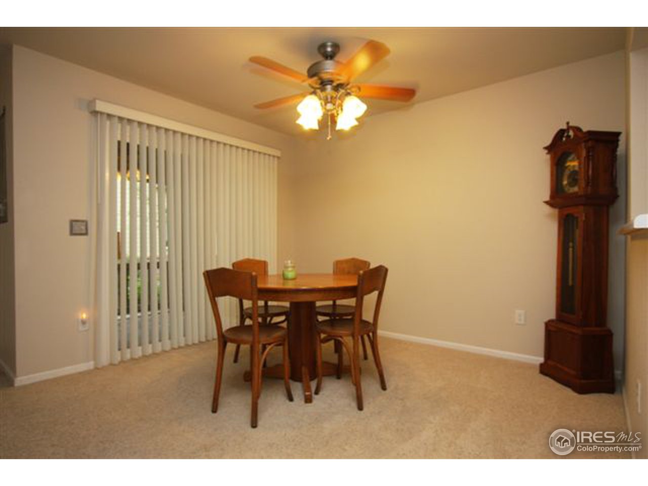 2621 Rigden Parkway, Unit C3 Fort Collins, CO 80525 - Photo 8 of 17 a view of a dining room with furniture and chandelier