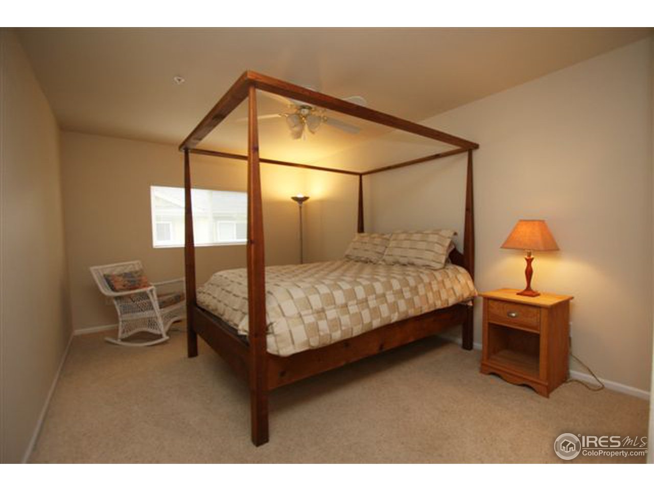 2621 Rigden Parkway, Unit C3 Fort Collins, CO 80525 - Photo 10 of 17 a bedroom with a bed chair and window