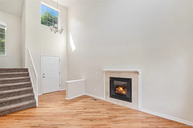 a view of a fireplace with wooden floor
