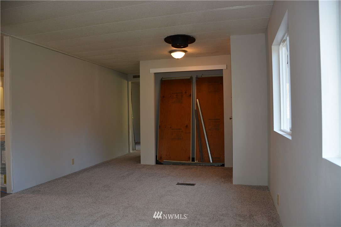 12606 Chain Lake Road Snohomish, WA 98290 - Photo 16 of 25 an empty room with closet