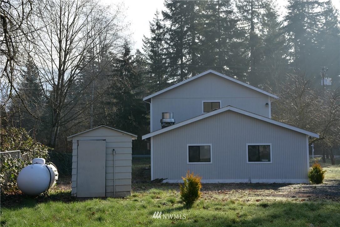 12606 Chain Lake Road Snohomish, WA 98290 - Photo 3 of 25 a house with yard in front of it