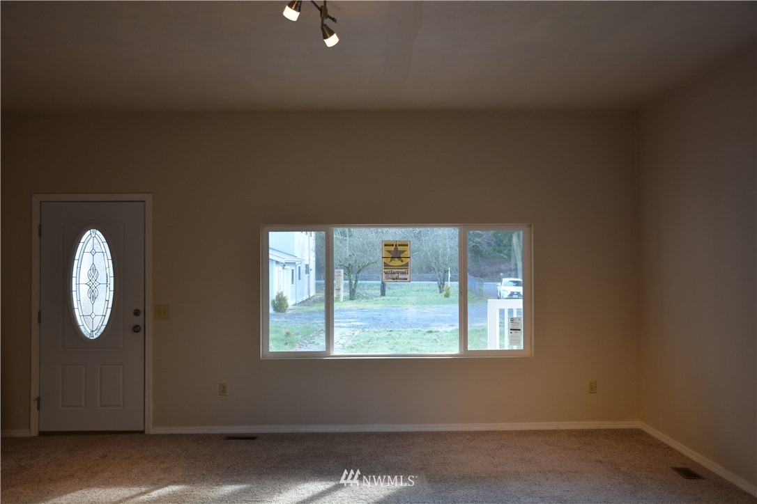 12606 Chain Lake Road Snohomish, WA 98290 - Photo 8 of 25 a view of entryway with wooden floor