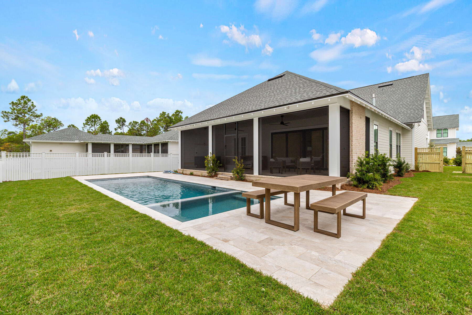 314 West Firethorn Circle, Unit LOT 33 Watersound, FL 32461 - Photo 11 of 32 a view of house with yard and outdoor seating