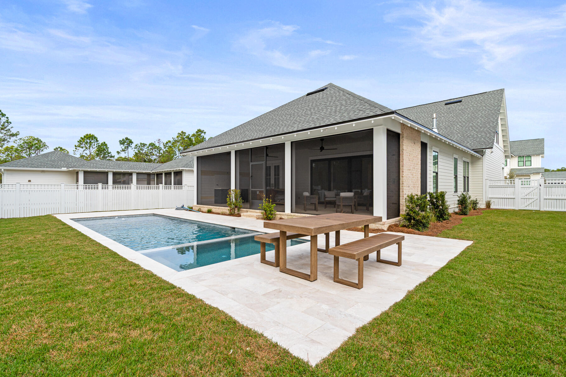 314 West Firethorn Circle, Unit LOT 33 Watersound, FL 32461 - Photo 8 of 32 a view of a house with swimming pool and porch