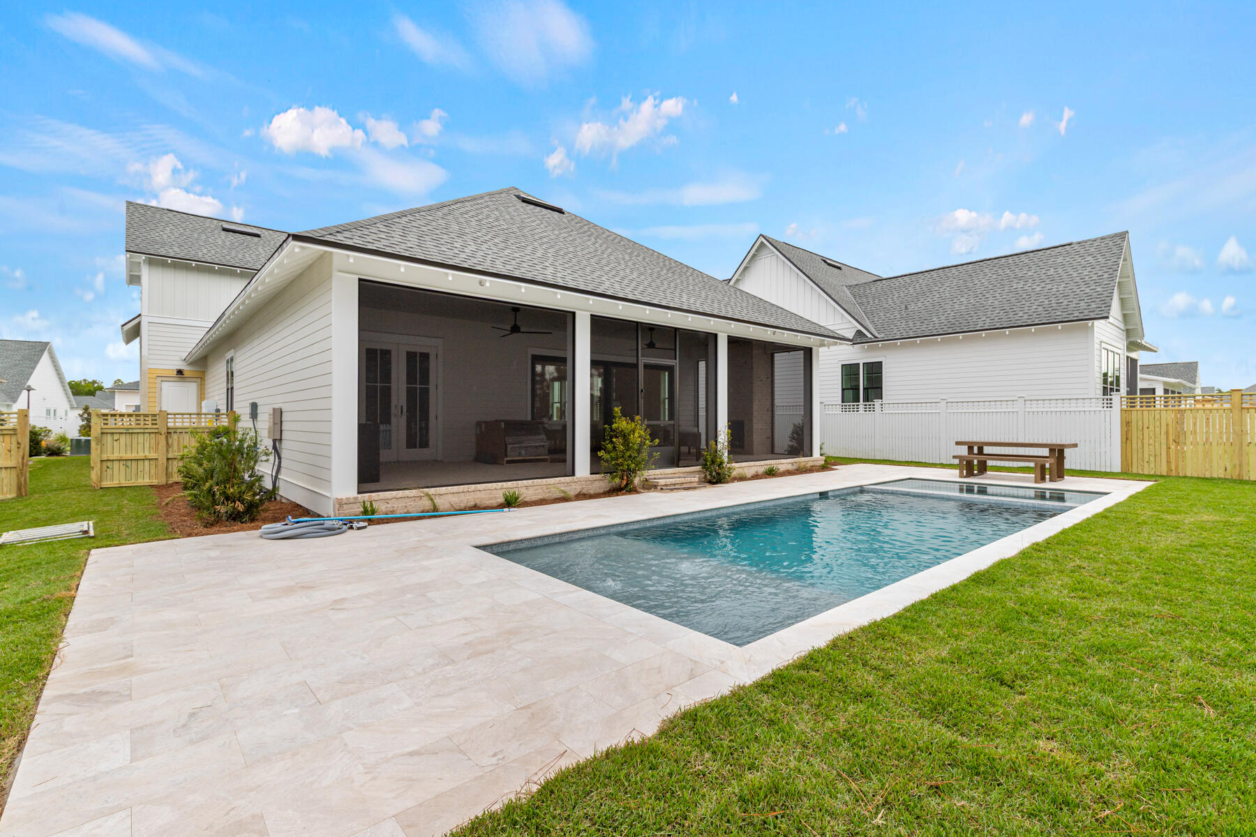 314 West Firethorn Circle, Unit LOT 33 Watersound, FL 32461 - Photo 10 of 32 a view of a house with a yard and swimming pool