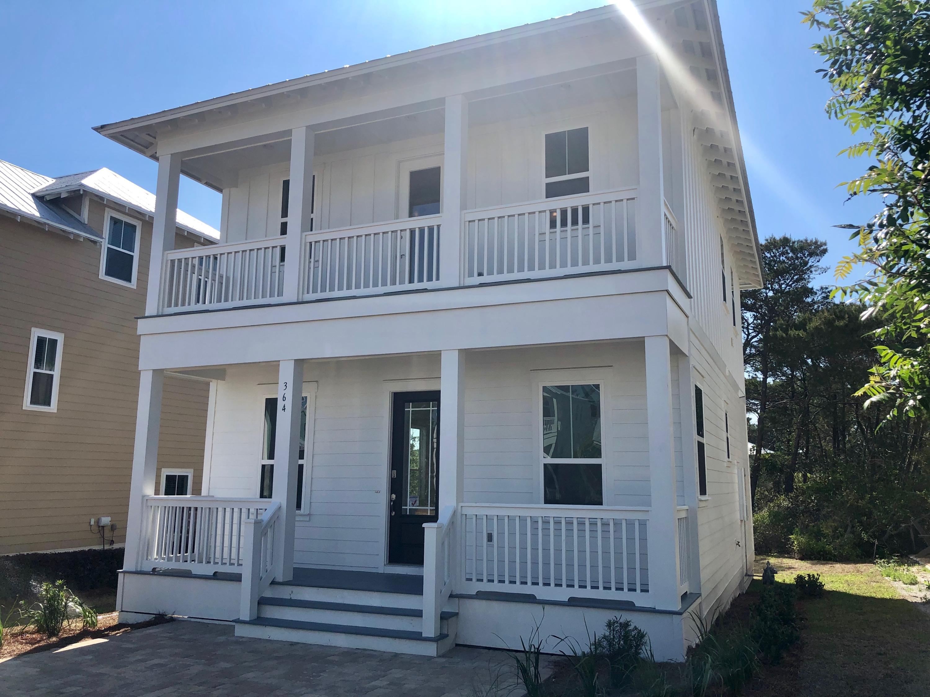 364 Grande Pointe Circle Inlet Beach, FL 32461 - Photo 2 of 33 a view of a house with a yard