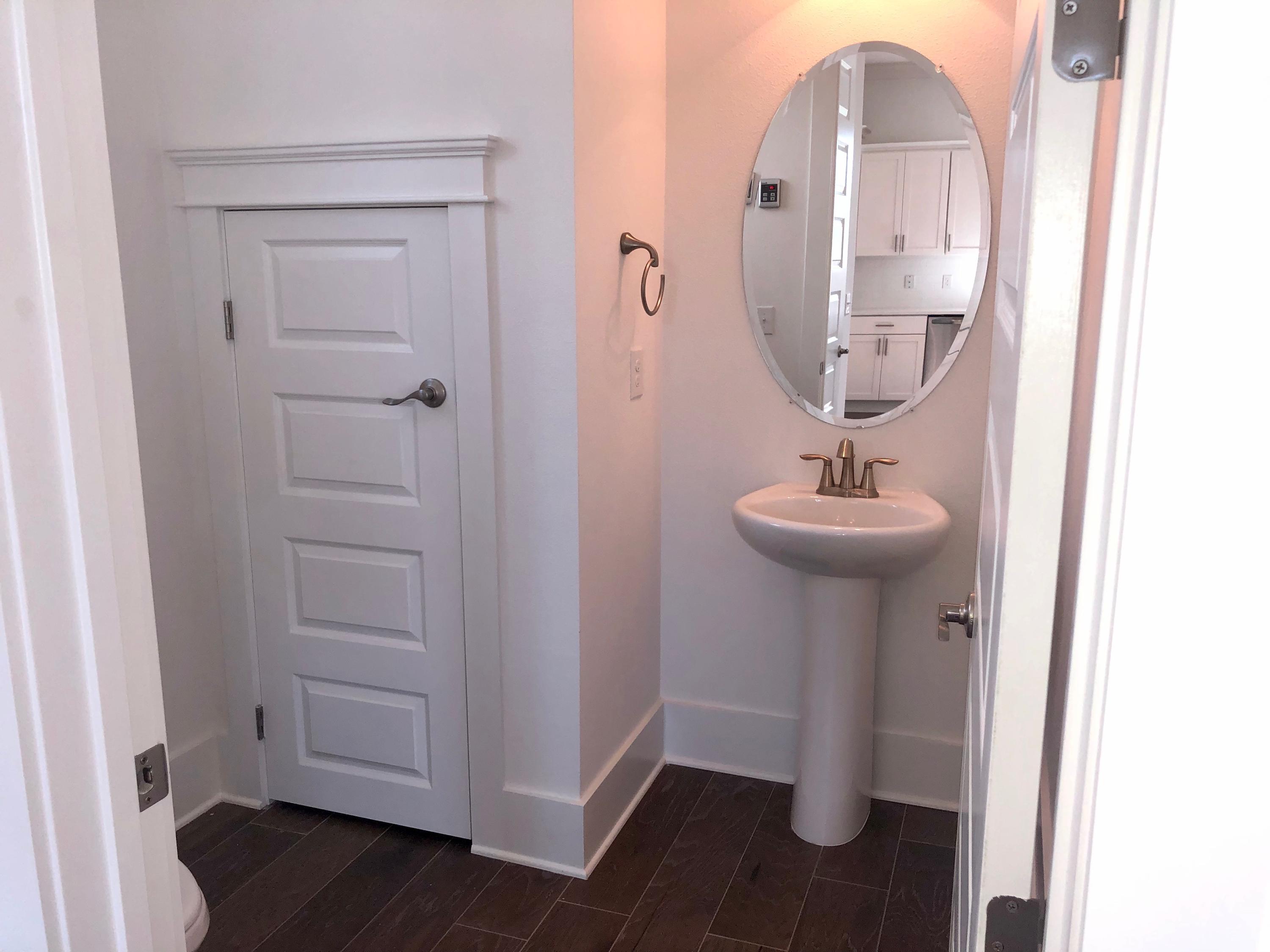 364 Grande Pointe Circle Inlet Beach, FL 32461 - Photo 11 of 33 a bathroom with a sink a mirror and shower view