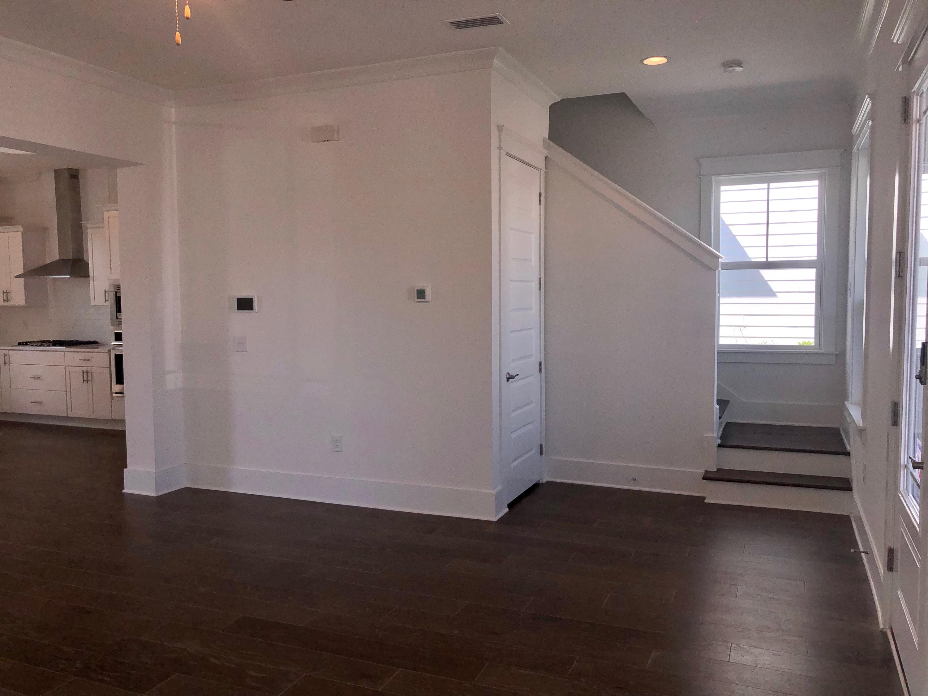 364 Grande Pointe Circle Inlet Beach, FL 32461 - Photo 12 of 33 an empty room with wooden floor and windows