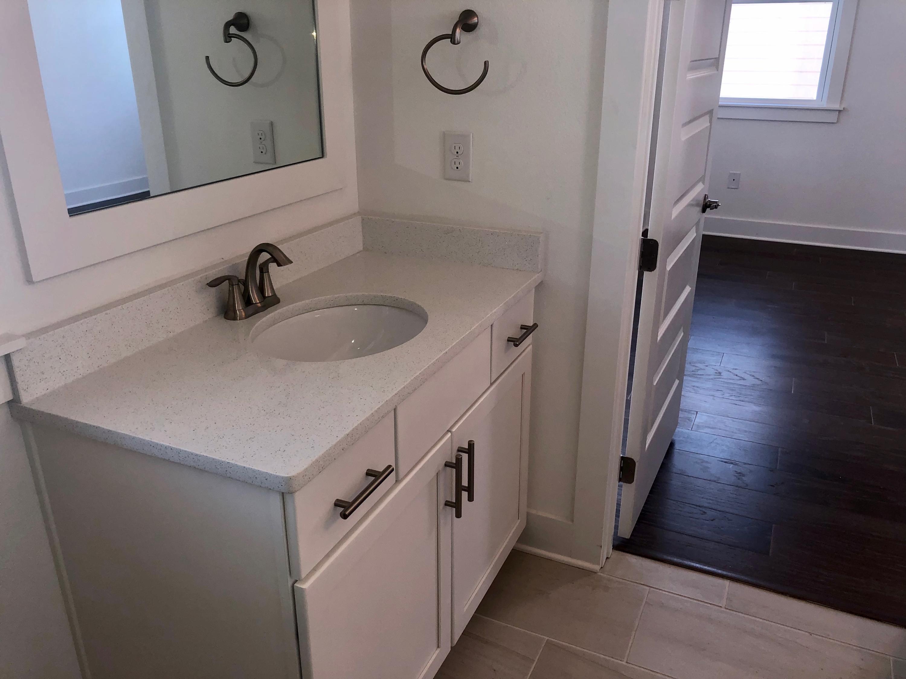 364 Grande Pointe Circle Inlet Beach, FL 32461 - Photo 17 of 33 a bathroom with a sink and mirror