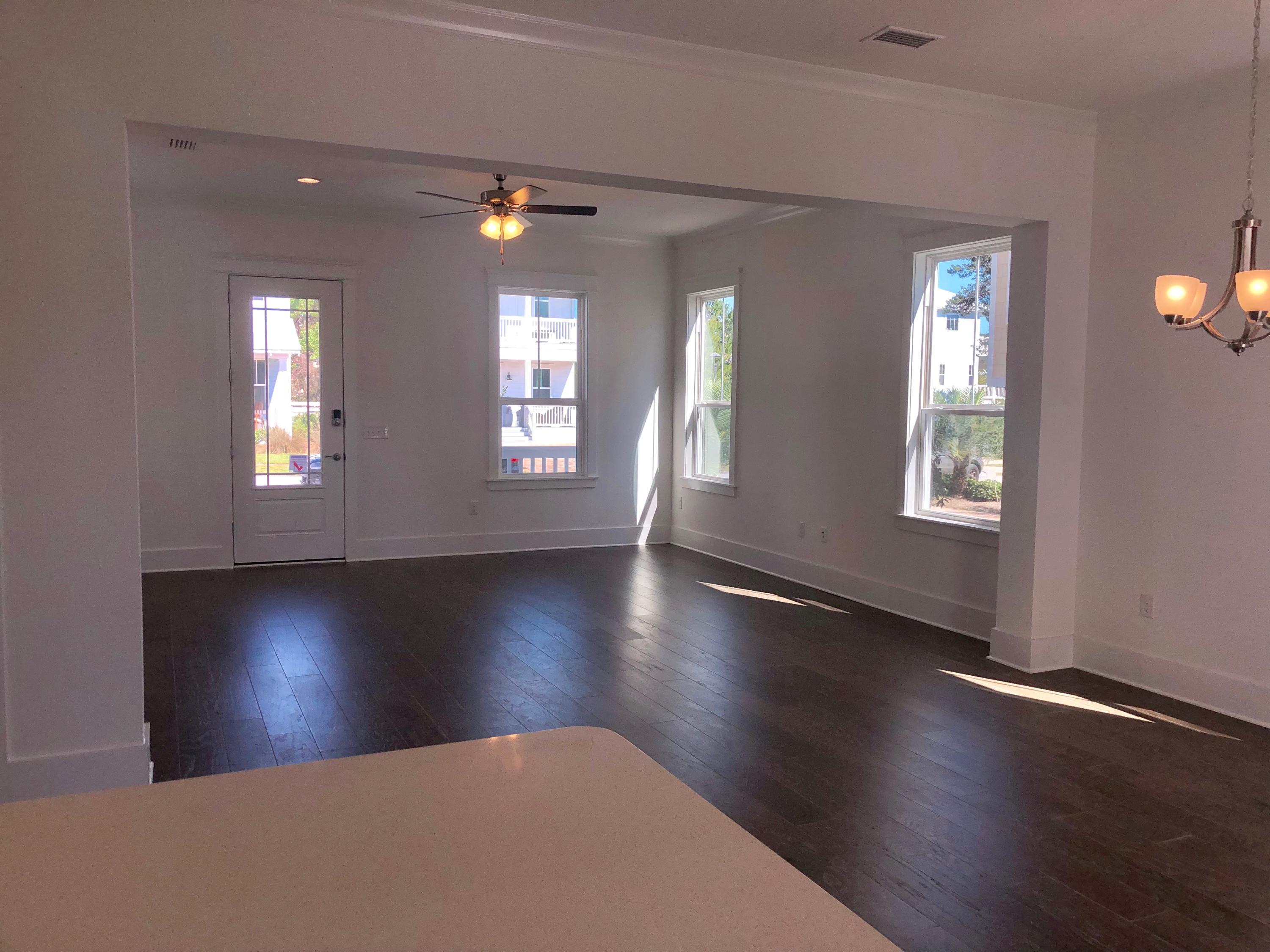 364 Grande Pointe Circle Inlet Beach, FL 32461 - Photo 10 of 33 a view of an empty room with wooden floor and a window